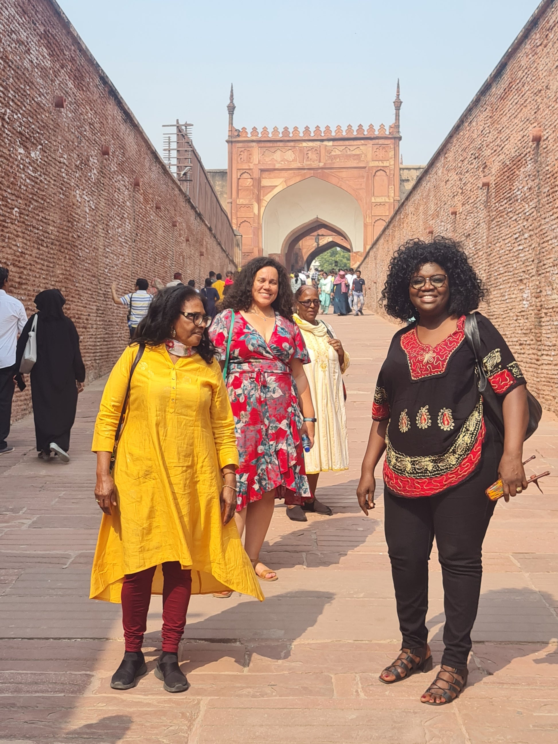 MINA visiting Agra Fort in India, the historic red sandstone monument that inspired her acrylic painting Sunset Walk at Agra Fort, Agra.